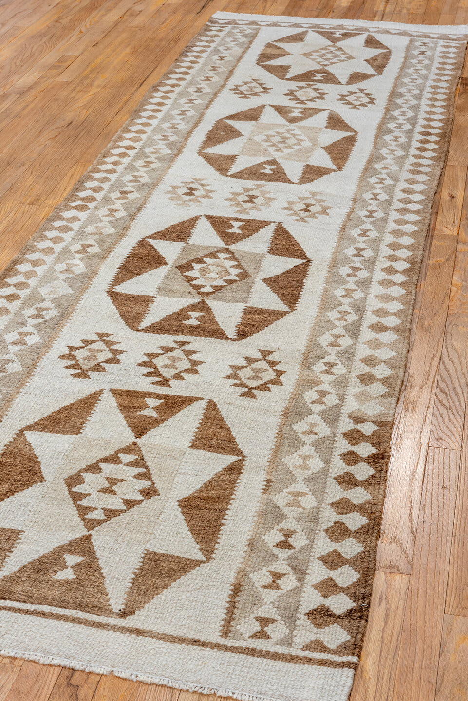 3' x 10' one-of-a-kind handmade antique Kilim runner rug. Color palette: ivory, camel, taupe, brown, beige, gray