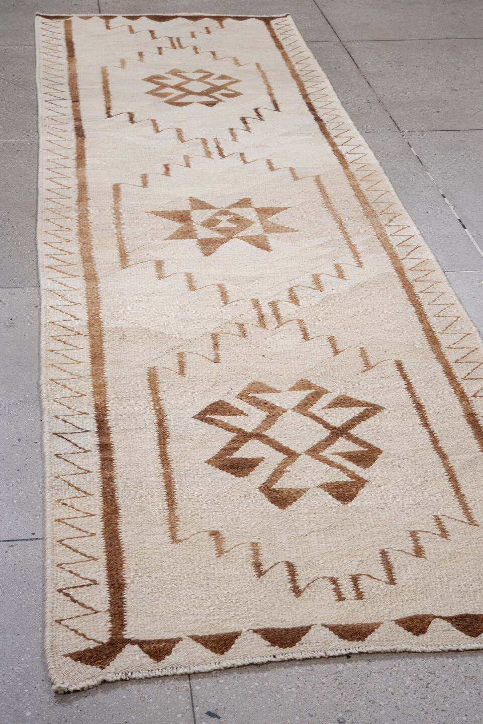 3' x 11' one-of-a-kind handmade antique Kilim runner rug. Color palette: ivory, camel, taupe, brown, beige, gray
