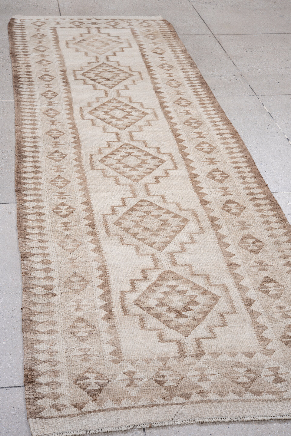 3' x 11' one-of-a-kind handmade vintage Kilim runner rug. Color palette: brown, gainsboro, gray, light gray, off-white, pink