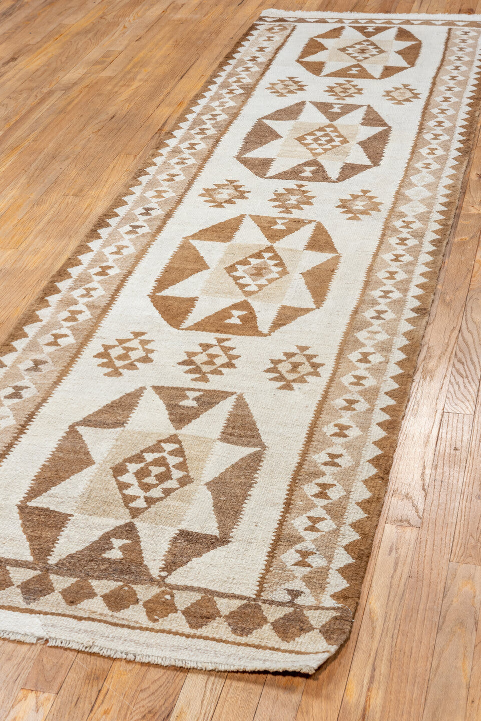 2' x 10' one-of-a-kind handmade antique Kilim runner rug. Color palette: ivory, taupe, camel, brown, beige, gray