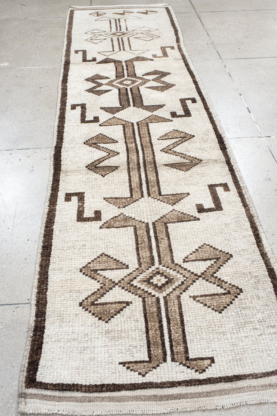 3' x 11' one-of-a-kind handmade vintage Kars runner rug. Color palette: brown, gray, light gray, linen, off-white, pink