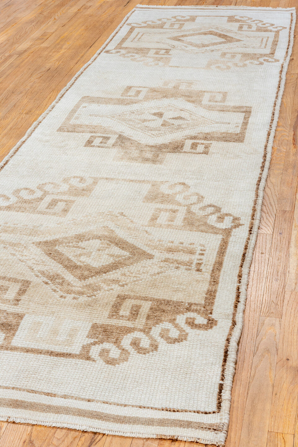 3' x 10' one-of-a-kind handmade vintage Kars runner rug. Color palette: ivory, taupe, beige, camel, cream, gray