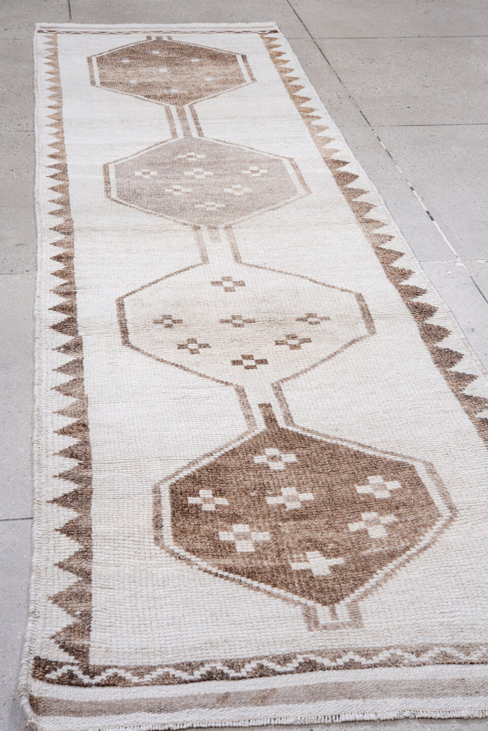3' x 11' one-of-a-kind handmade vintage Kars runner rug. Color palette: ivory, taupe, camel, beige, brown, gray