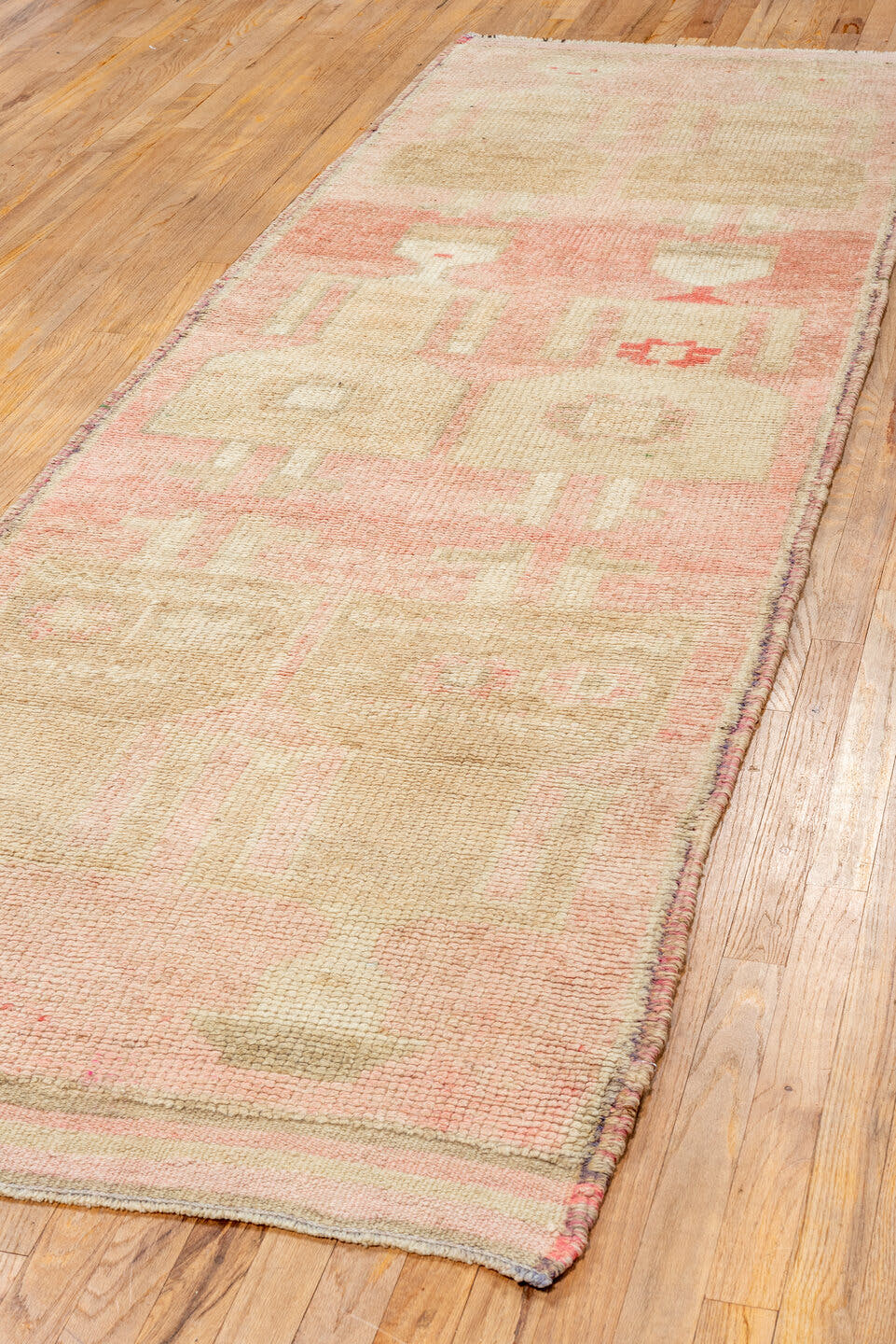 3' x 10' one-of-a-kind handmade antique Kars runner rug. Color palette: blush, ivory, taupe, rose, camel, sage, pink, beige
