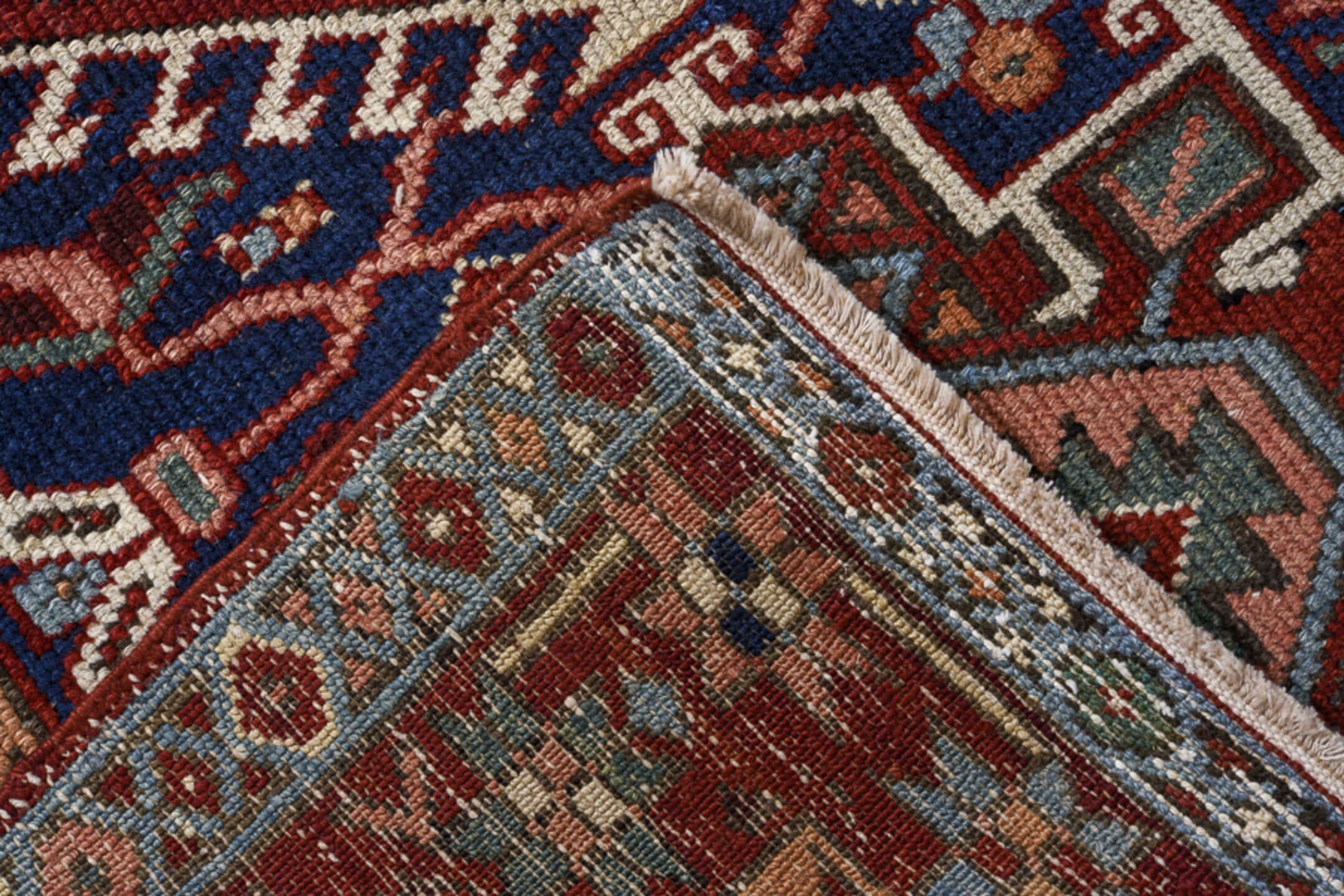 3' x 8' one-of-a-kind handmade antique Karaje runner rug. Color palette: navy, rust, sky blue, ivory, terracotta, sage