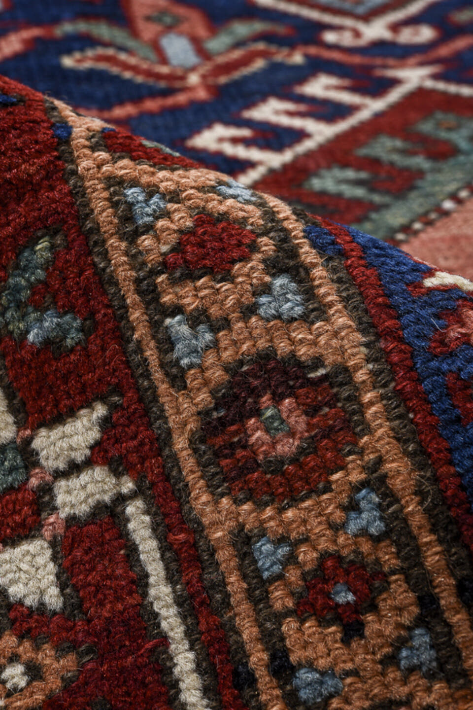 3' x 8' one-of-a-kind handmade antique Karaje runner rug. Color palette: navy, rust, sky blue, ivory, terracotta, sage
