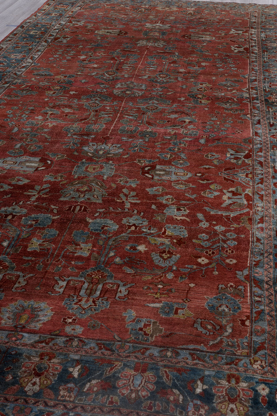 7' x 16' one-of-a-kind handmade antique Lilian rug. Color palette: rust, blue, ivory, slate, burgundy, camel, terracotta