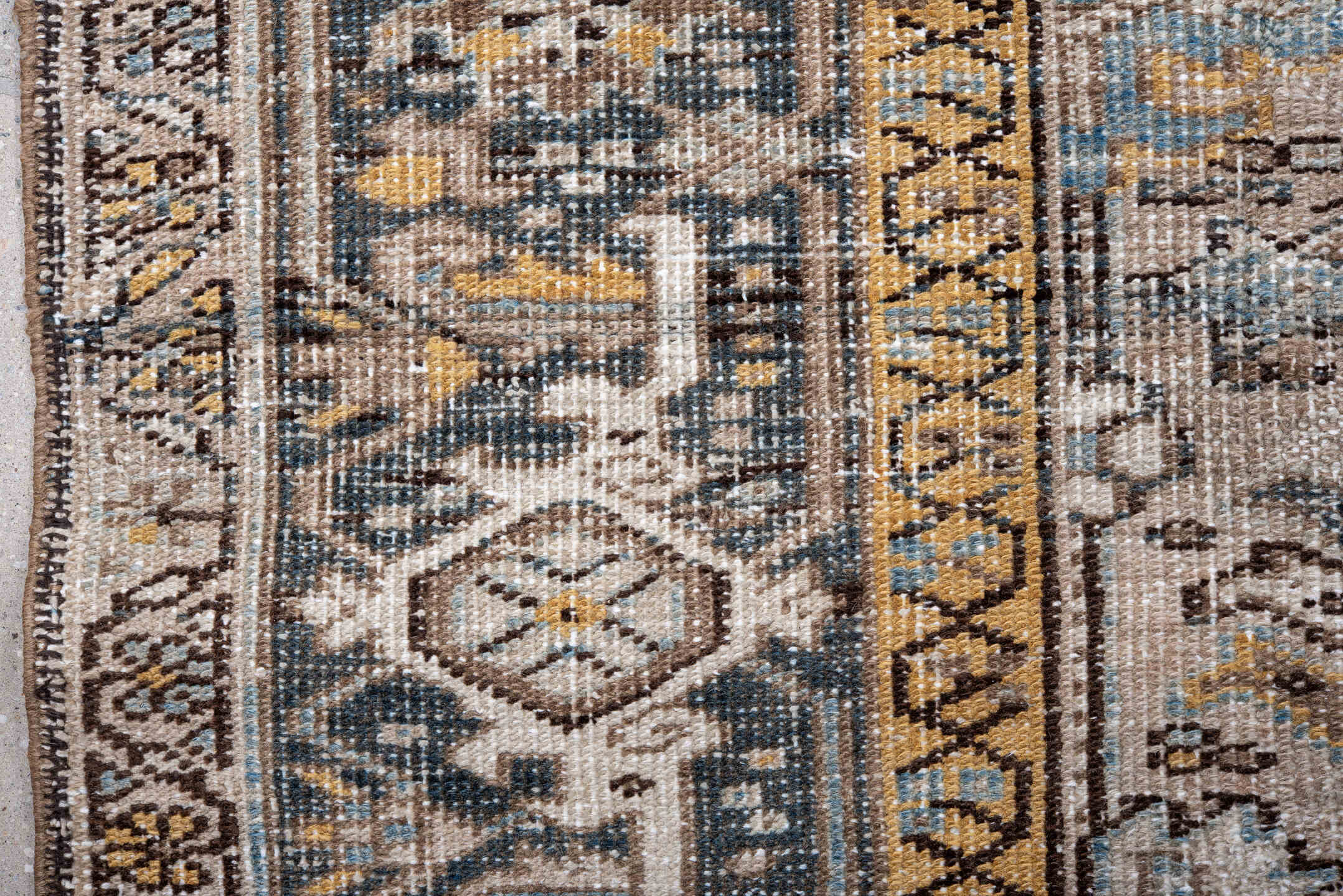 7' x 11' one-of-a-kind handmade antique Heriz large size rug. Color palette: taupe, ivory, charcoal, slate, gold, pale blue