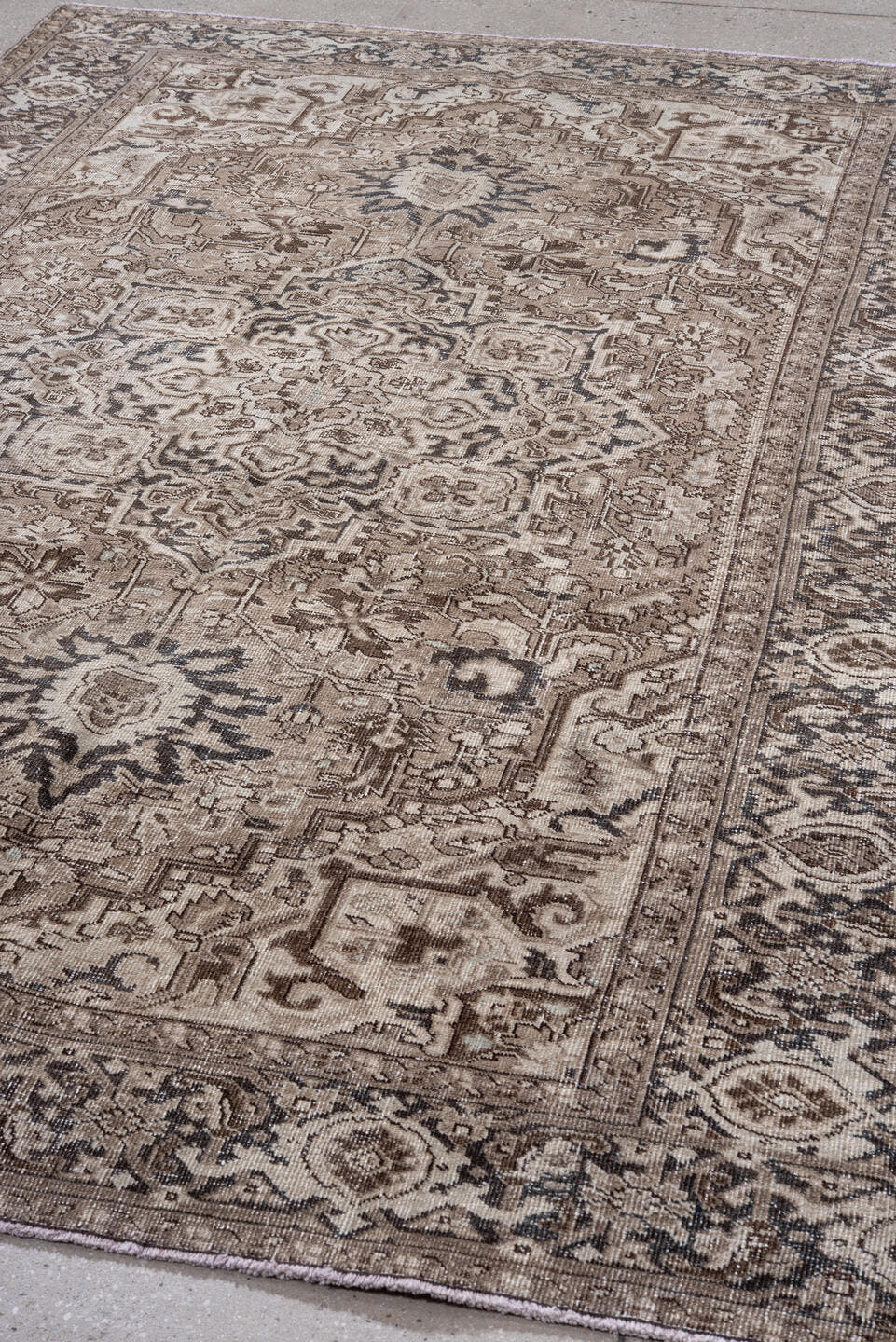 6' x 9' one-of-a-kind handmade antique Heriz medium size rug. Color palette: taupe, ivory, charcoal, brown, beige, gray