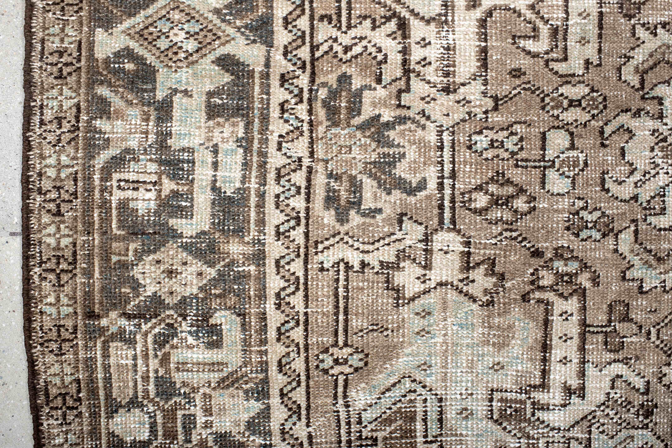 5' x 8' one-of-a-kind handmade antique Heriz medium size rug. Color palette: taupe, ivory, charcoal, brown, pale blue, cream