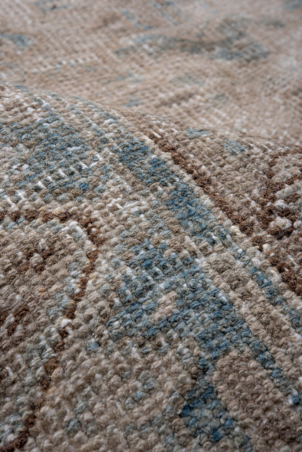 7' x 10' one-of-a-kind handmade antique Heriz large size rug. Color palette: ivory, sky blue, taupe, beige, camel, brown