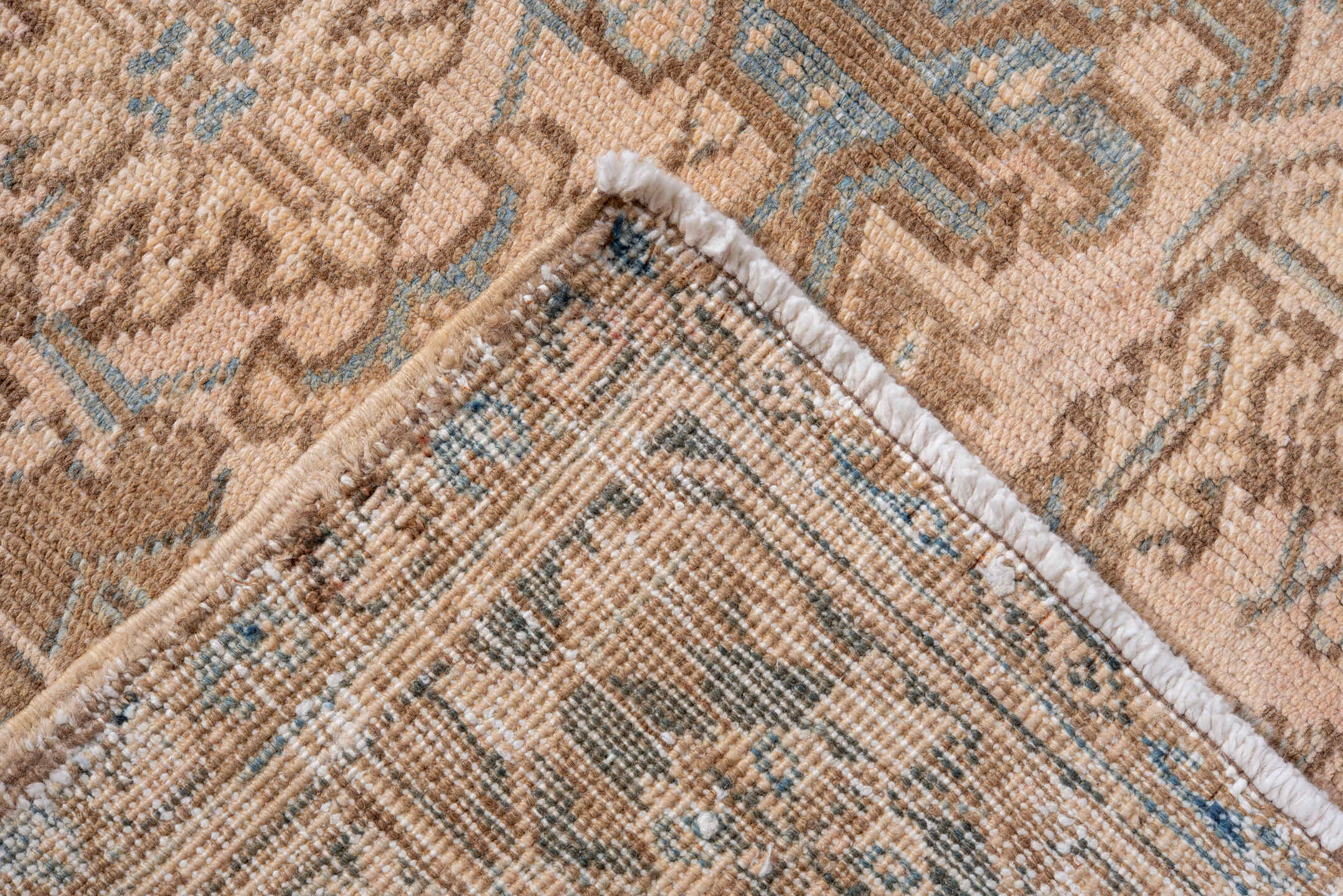 7' x 9' one-of-a-kind handmade antique Heriz rug. Color palette: ivory, taupe, sky blue, brown, camel, slate, beige, gray