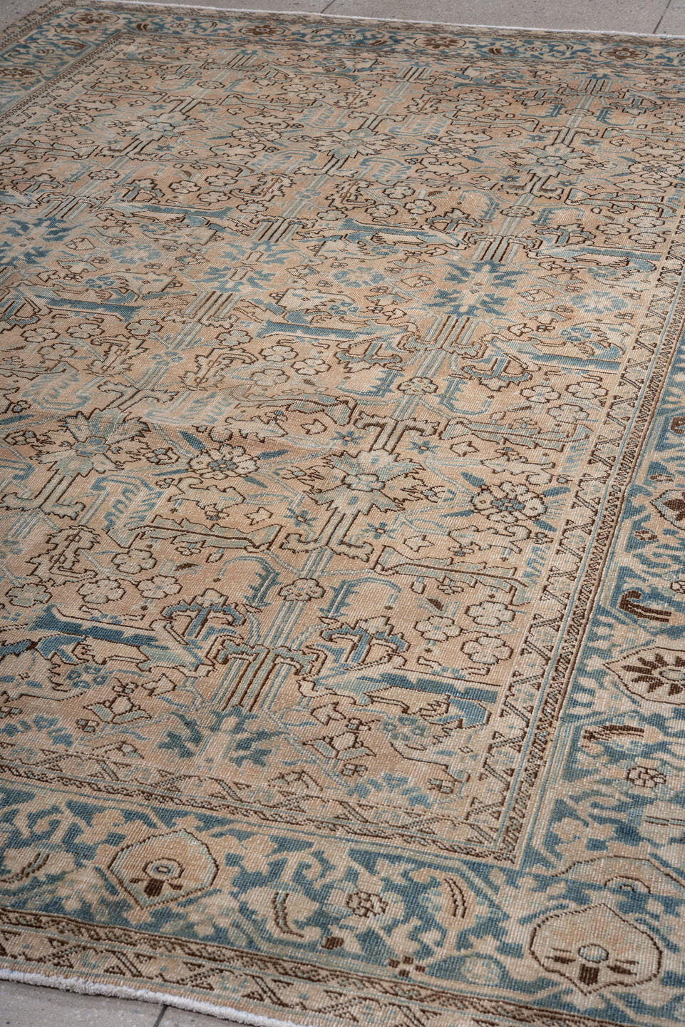 7' x 11' one-of-a-kind handmade antique Heriz large size rug. Color palette: ivory, sky blue, taupe, camel, brown