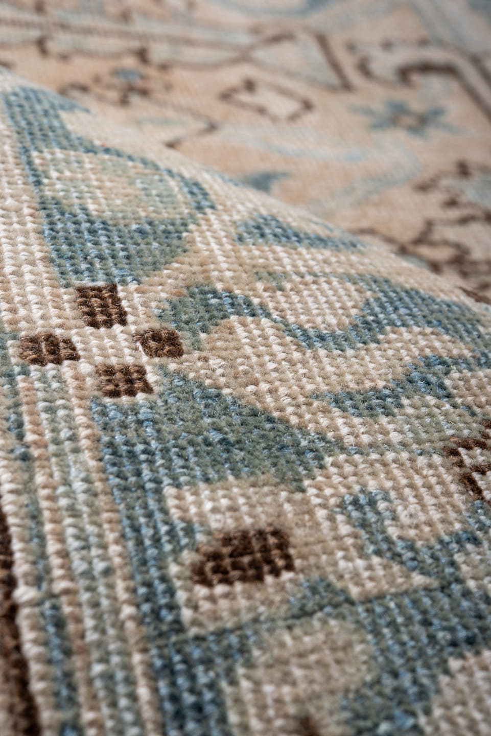 7' x 11' one-of-a-kind handmade antique Heriz large size rug. Color palette: ivory, sky blue, taupe, camel, brown