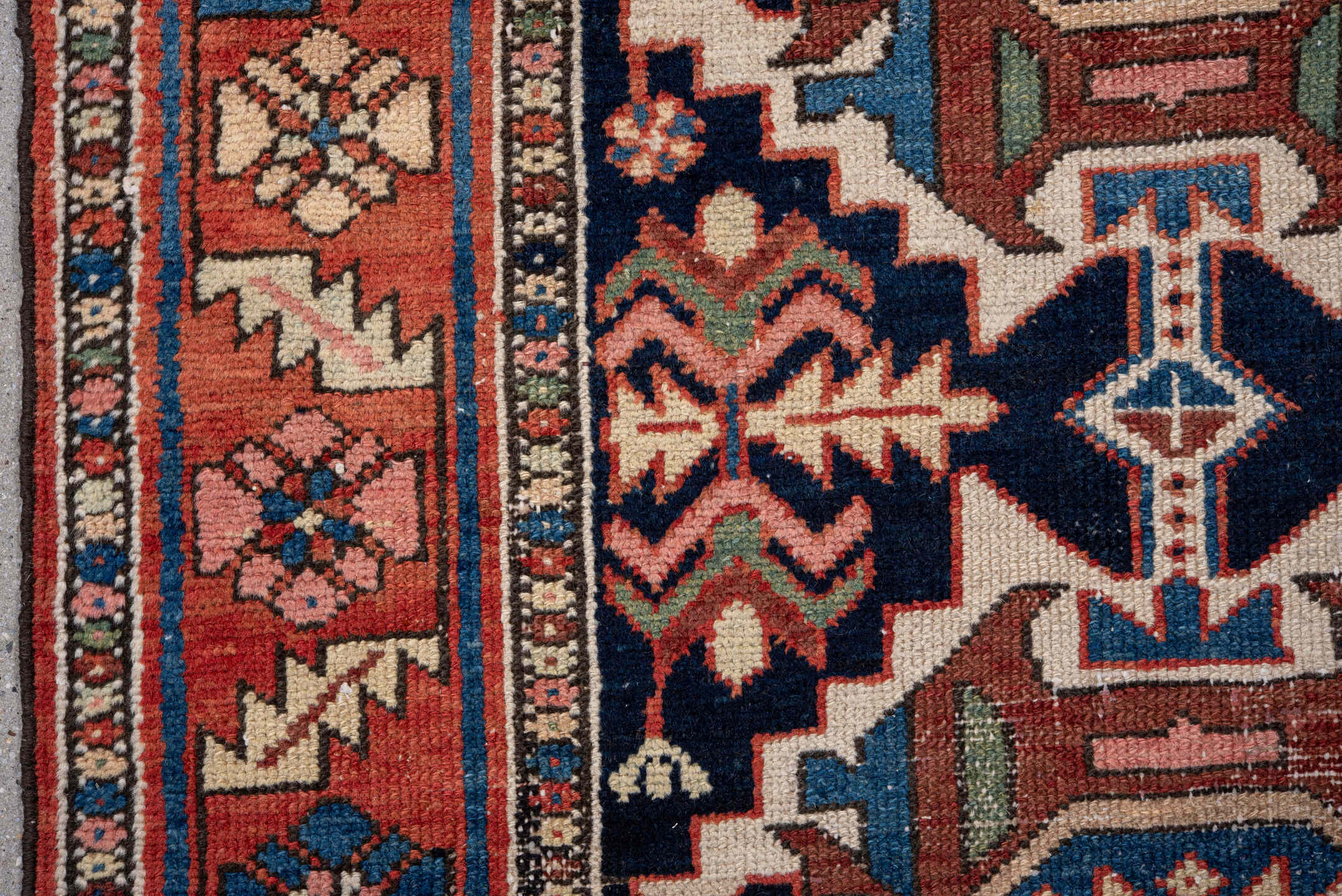 3' x 10' one-of-a-kind handmade vintage Karaje runner rug. Color palette: blue, brown, gray, light gray, off-white, pink