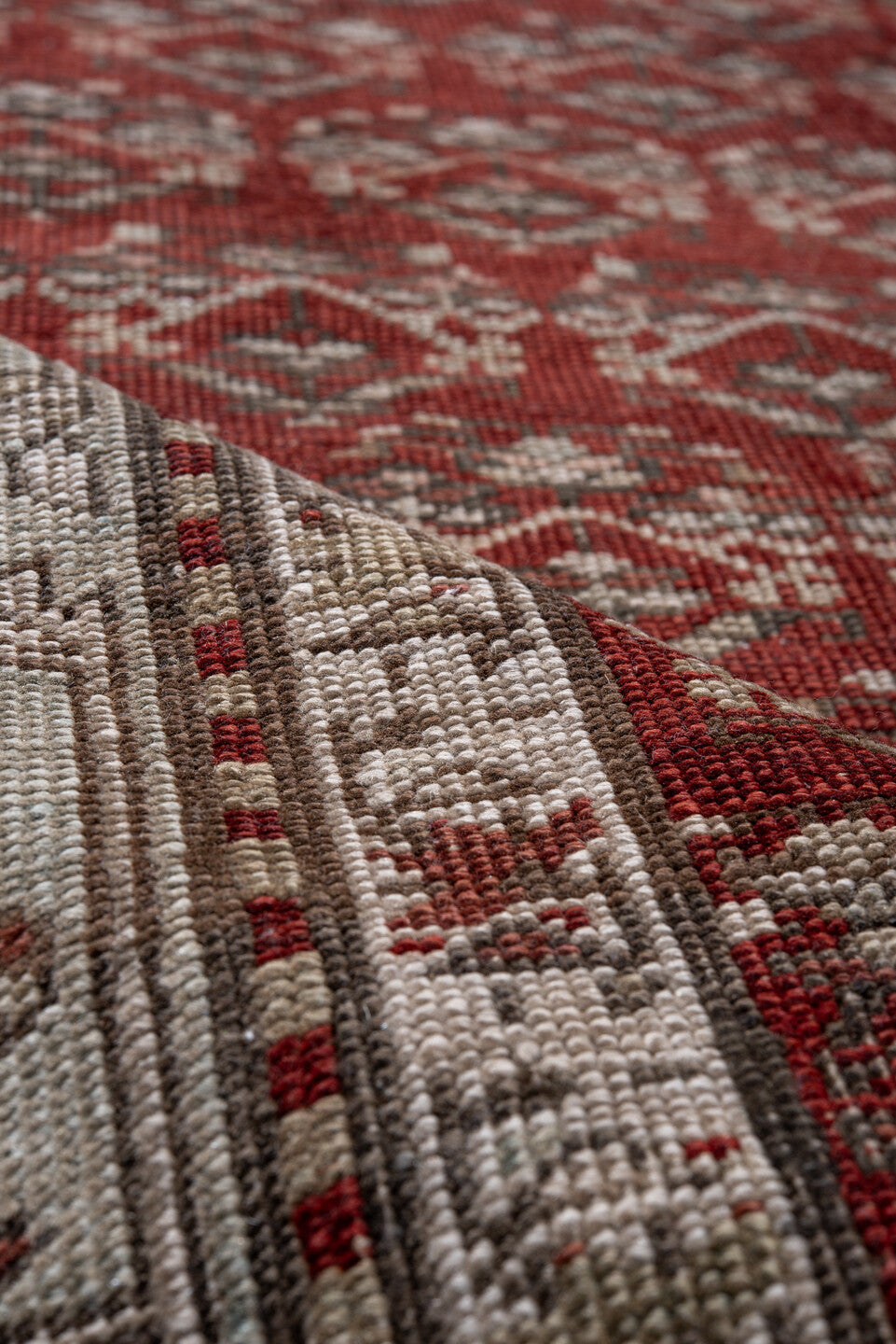 2' x 14' one-of-a-kind handmade vintage Caucasian runner rug. Color palette: brown, gray, light gray, off-white, pink, red
