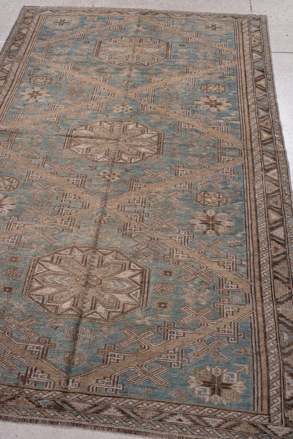 4' x 7' one-of-a-kind handmade vintage Sumak rug. Color palette: blue, brown, dim gray, gray, light gray, off-white, pink