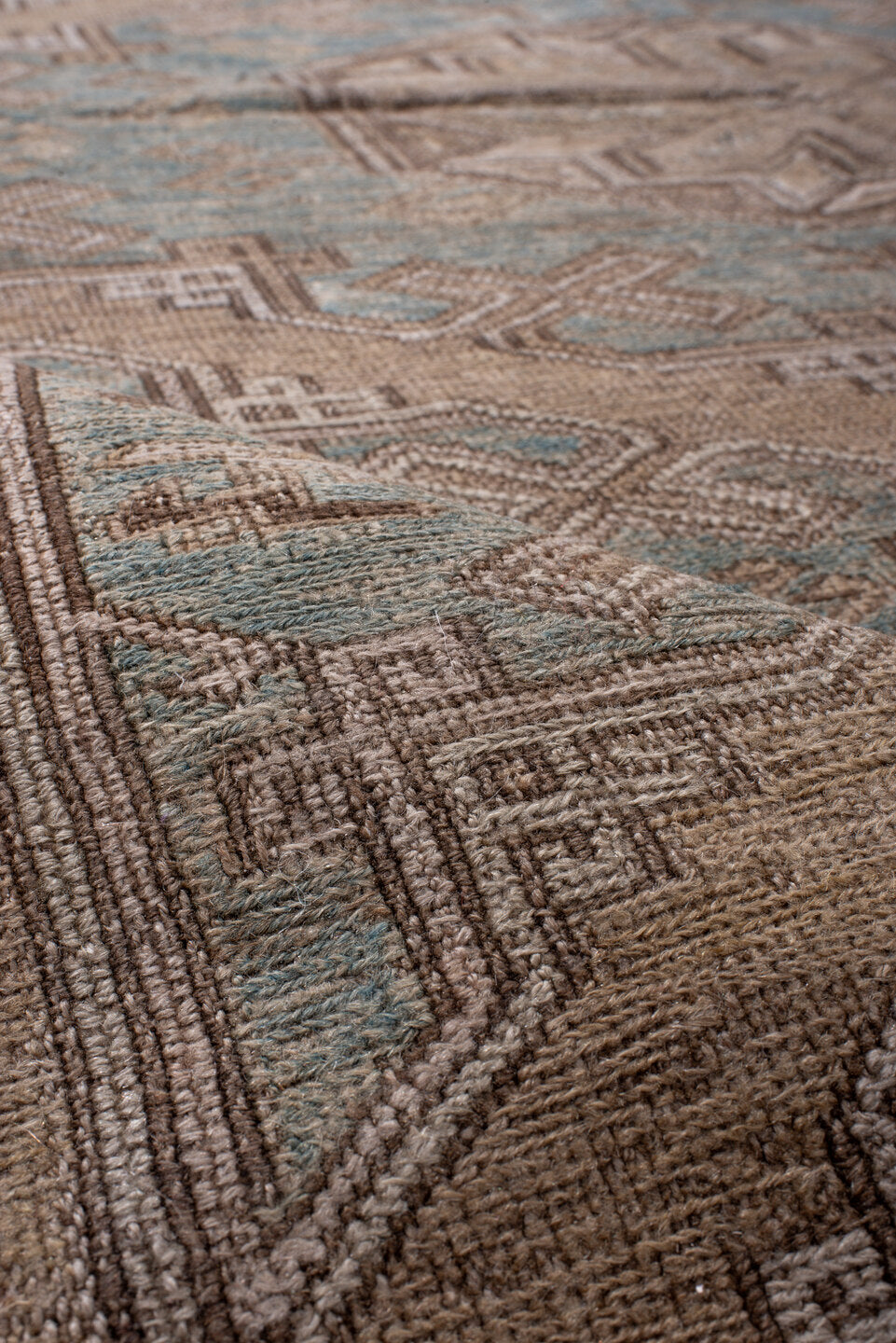 4' x 7' one-of-a-kind handmade vintage Sumak rug. Color palette: blue, brown, dim gray, gray, light gray, off-white, pink