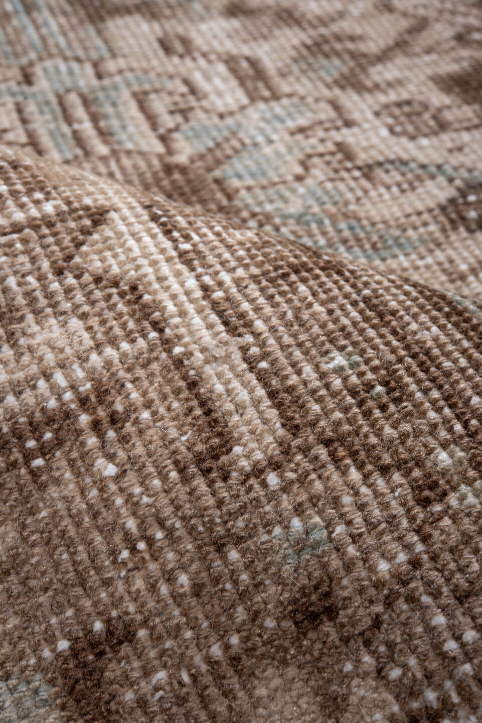 7' x 9' one-of-a-kind handmade antique Heriz rug. Color palette: taupe, brown, ivory, pale blue, beige, gray, light blue