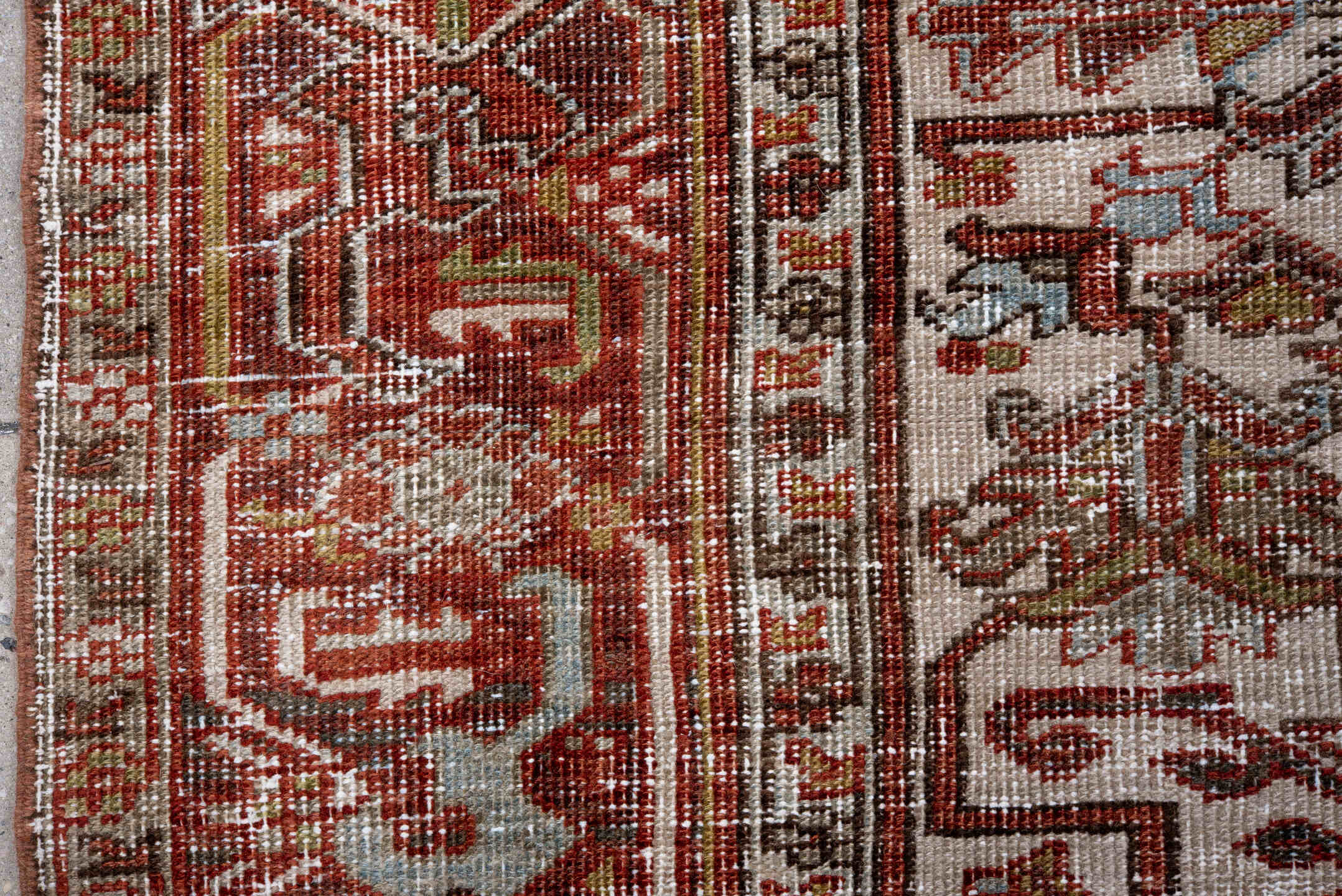 6' x 8' one-of-a-kind handmade antique Heriz rug. Color palette: ivory, rust, brick, sky blue, olive, taupe, brown, charcoal