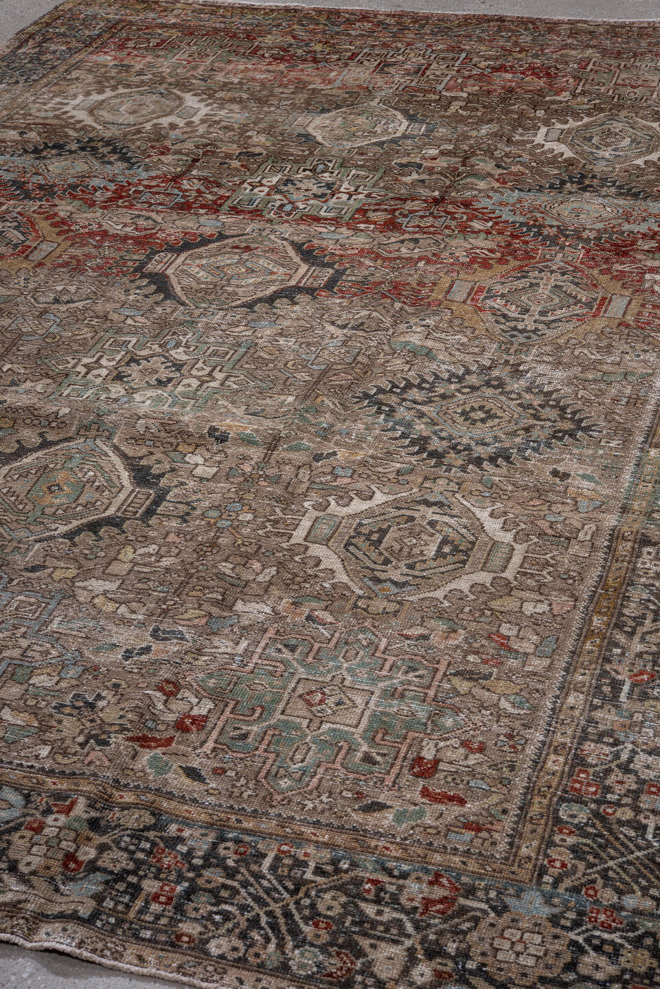 7' x 10' one-of-a-kind handmade antique Karaje large size rug. Color palette: taupe, brown, ivory, rust, slate, pale_blue