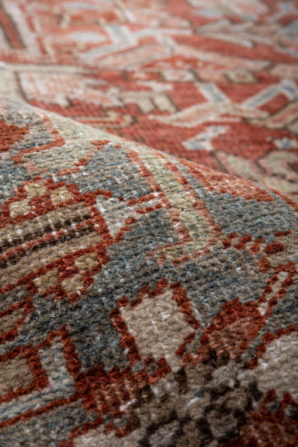 7' x 10' one-of-a-kind handmade vintage Heriz large size rug. Color palette: rust, sky blue, ivory, taupe, sage, burgundy