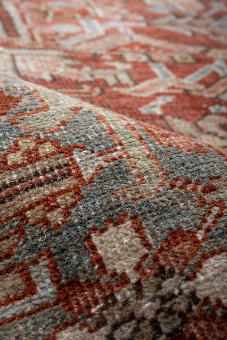 7' x 10' one-of-a-kind handmade vintage Heriz large size rug. Color palette: rust, sky blue, ivory, taupe, sage, burgundy