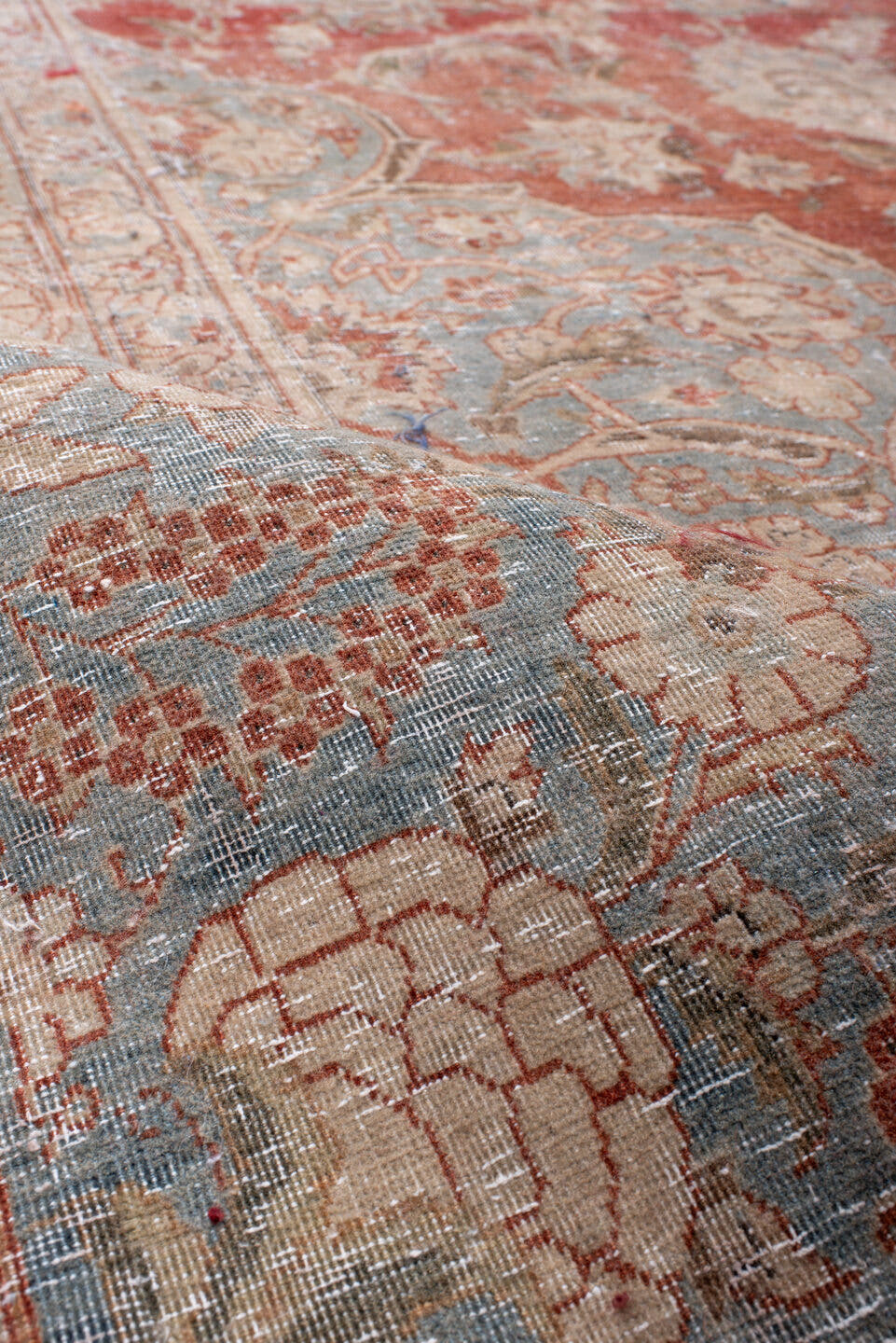 10' x 17' one-of-a-kind handmade antique Kashan rug. Color palette: rust, light blue, ivory, terra cotta, beige, taupe