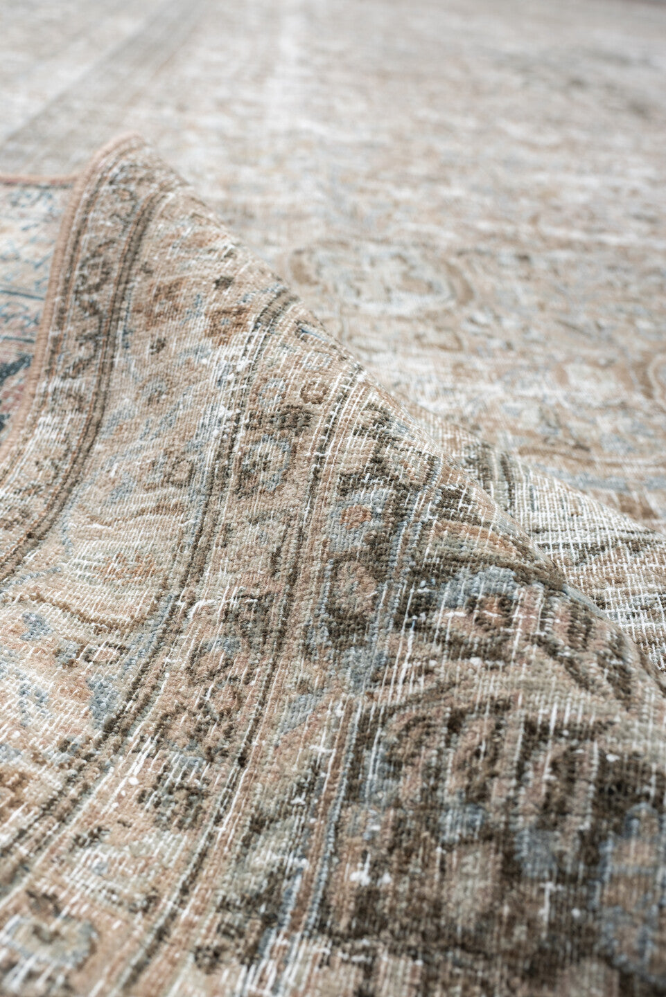 10' x 16' one-of-a-kind handmade antique Khorassan oversize rug. Color palette: ivory, taupe, blue gray, slate, beige, camel
