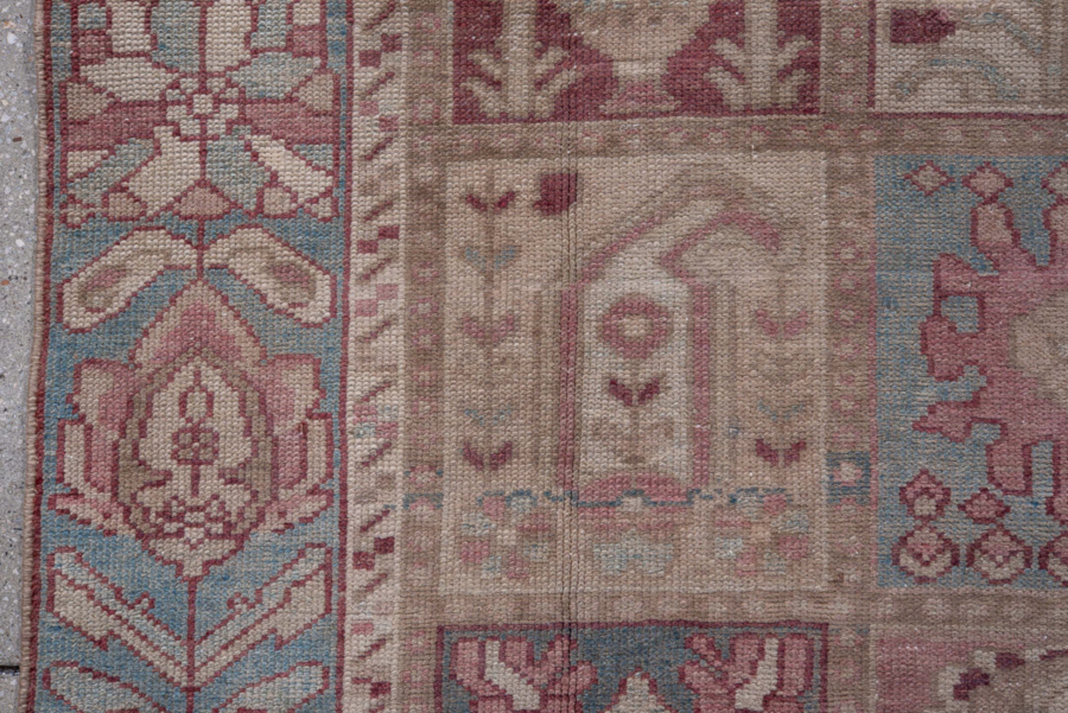 4' x 6' one-of-a-kind handmade antique Baktiary small size rug. Color palette: ivory, sky blue, rose, taupe, dusty pink