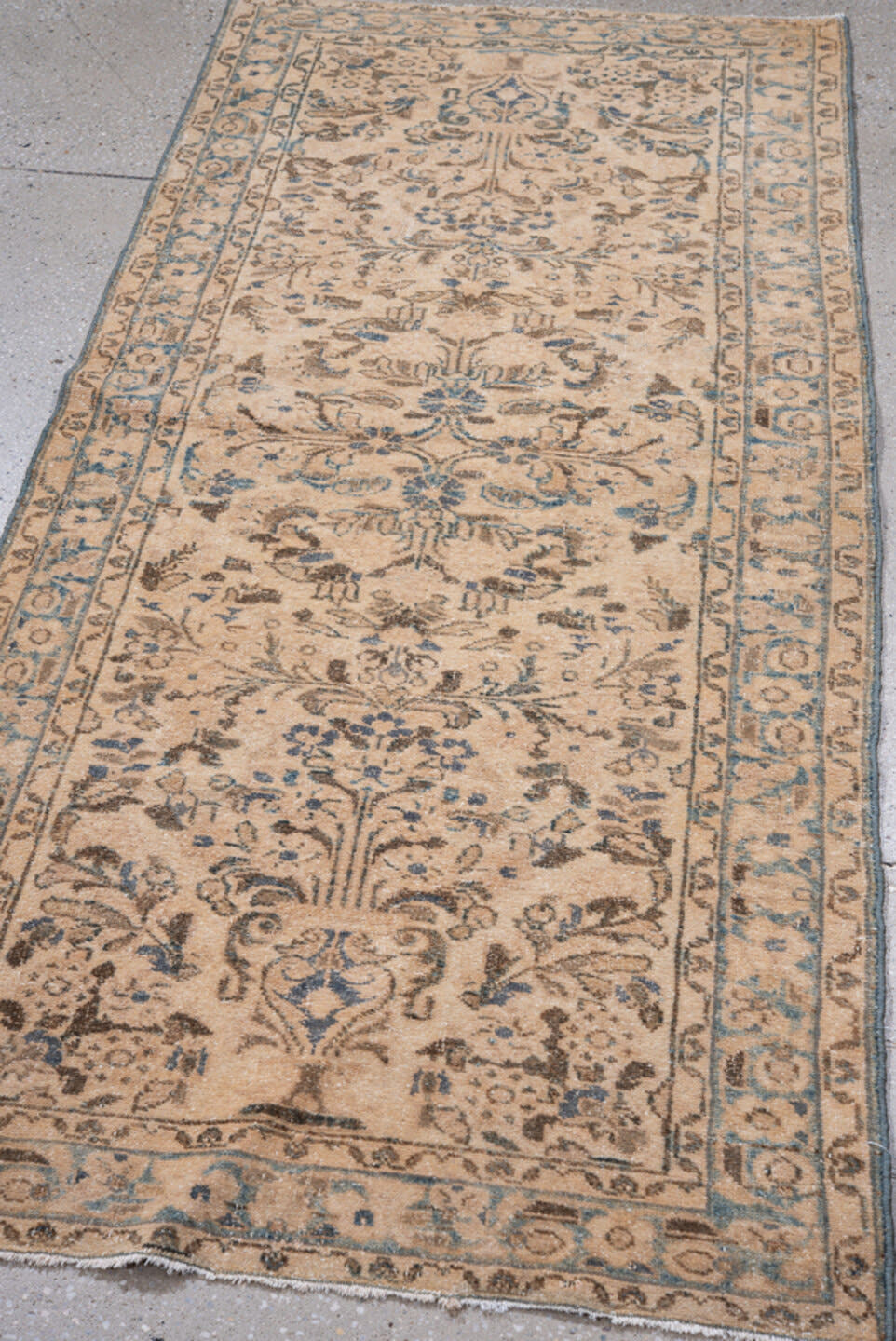 2' x 6' one-of-a-kind handmade antique Lilian runner rug. Color palette: ivory, sky blue, brown, taupe, beige, light blue