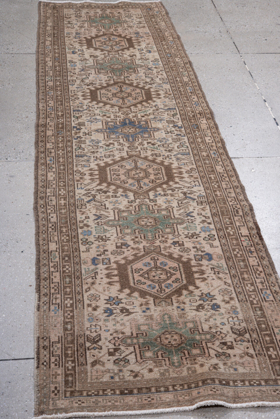 2' x 9' one-of-a-kind handmade antique Karaje runner rug. Color palette: ivory, brown, taupe, slate blue, sage, charcoal