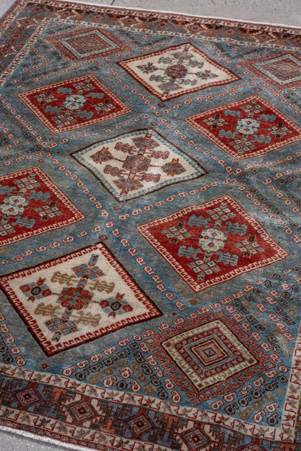 4' x 5' one-of-a-kind handmade antique Afshar small size rug. Color palette: sky blue, rust, ivory, deep brown, slate