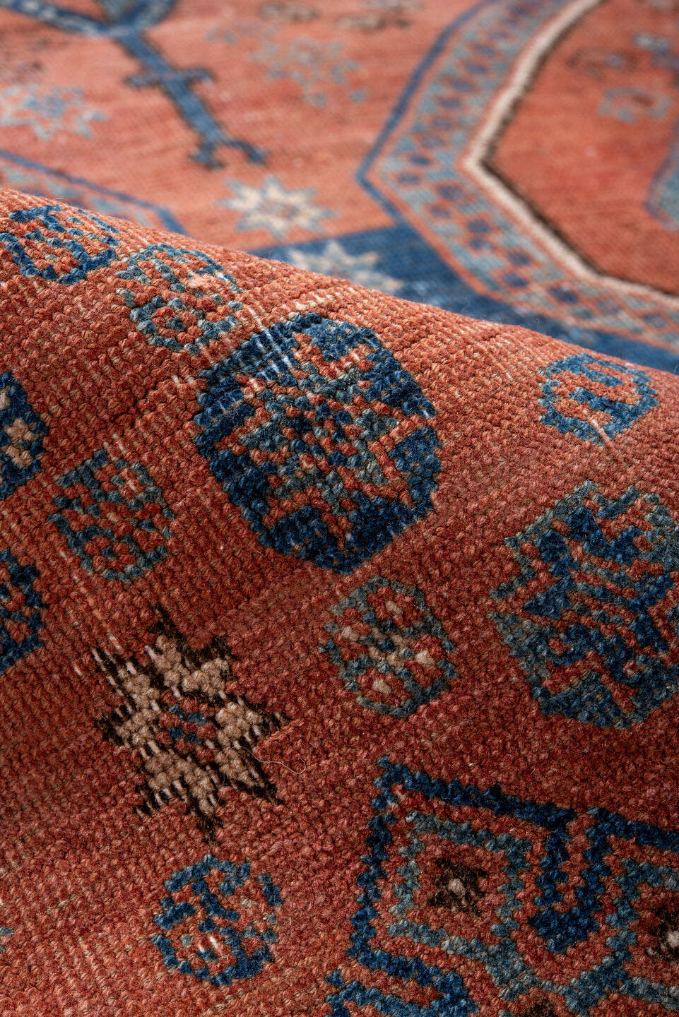 4' x 6' one-of-a-kind handmade antique Afshar small size rug. Color palette: terra cotta, indigo, ivory, rust, slate, camel