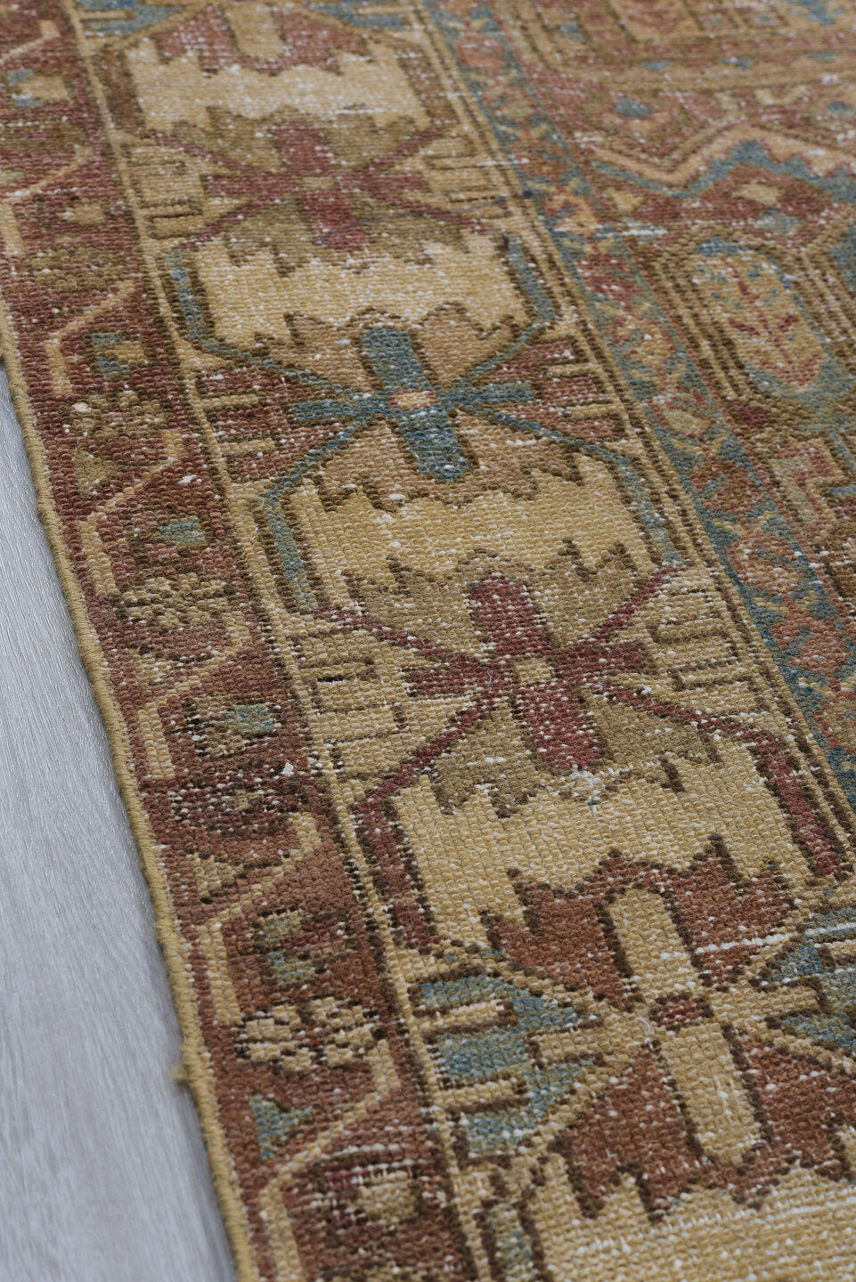 6' x 9' one-of-a-kind handmade vintage Baktiary medium size rug. Color palette: brown, gray, light gray, off-white, pink