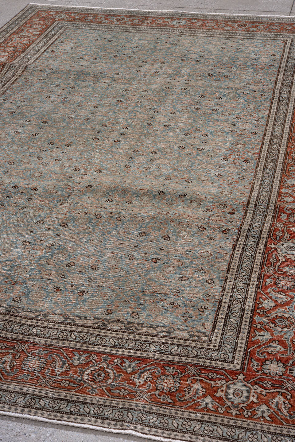 6' x 9' one-of-a-kind handmade vintage Tabriz medium size rug. Color palette: pale blue, rust, ivory, taupe, slate, charcoal