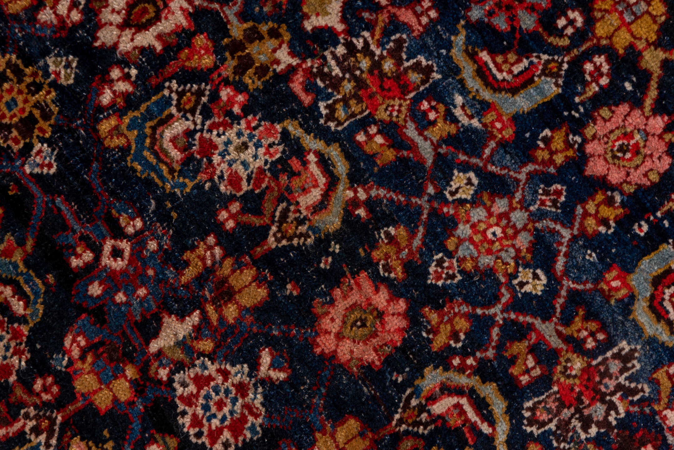 4' x 12' one-of-a-kind handmade vintage Bidjar runner rug. Color palette: black, blue, brown, gray, pink, red, redwood