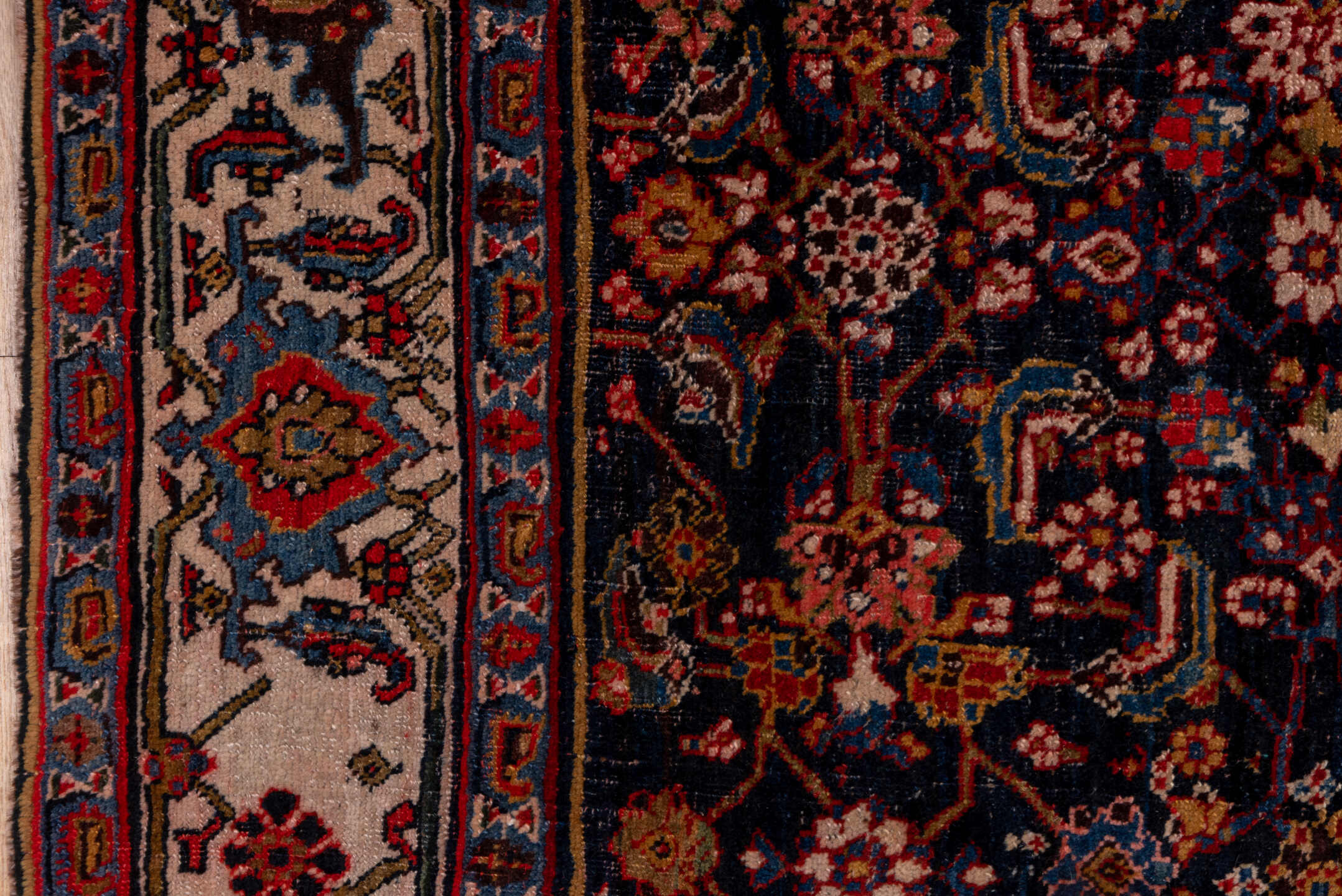 4' x 12' one-of-a-kind handmade vintage Bidjar runner rug. Color palette: black, blue, brown, gray, pink, red, redwood