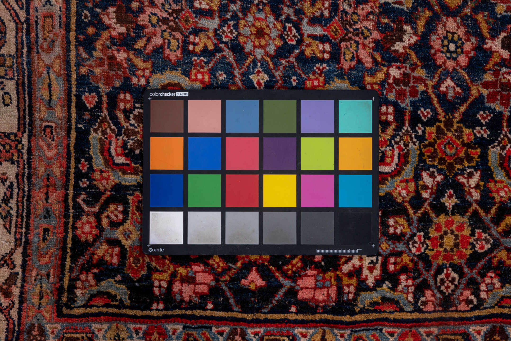 4' x 12' one-of-a-kind handmade vintage Bidjar runner rug. Color palette: black, blue, brown, gray, pink, red, redwood