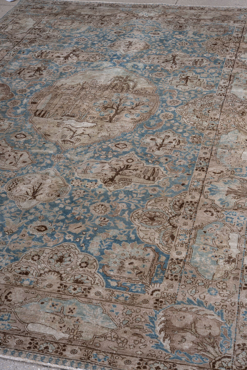 6' x 9' one-of-a-kind handmade antique Tabriz medium size rug. Color palette: sky blue, ivory, taupe, brown, beige