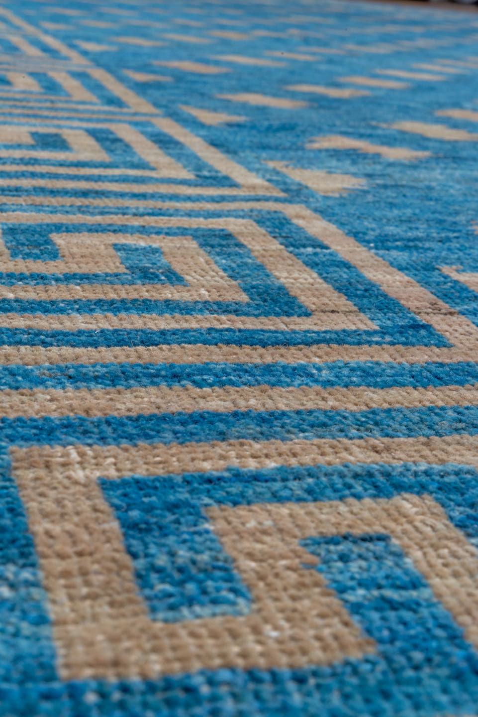12' x 16' one-of-a-kind handmade handmade Modern oversize rug. Color palette: turquoise, ivory, sky blue, teal, light blue