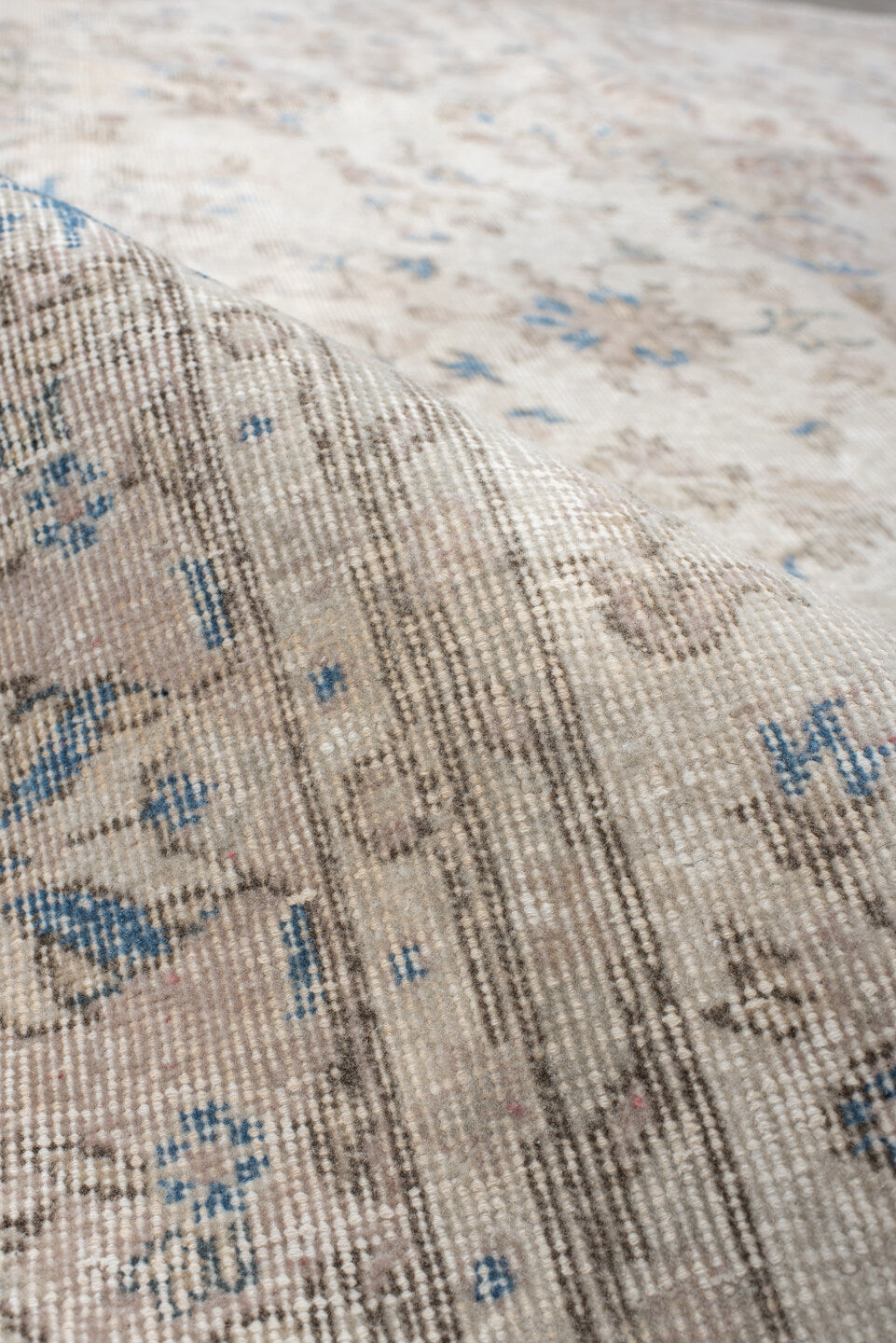 6' x 9' one-of-a-kind handmade antique Sparta medium size rug. Color palette: ivory, beige, sky blue, taupe, cream