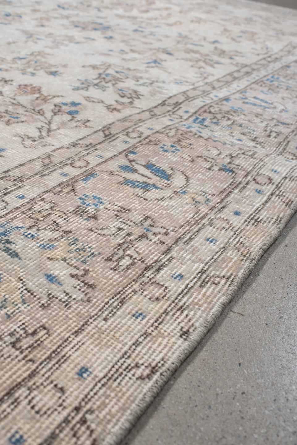 6' x 9' one-of-a-kind handmade antique Sparta medium size rug. Color palette: ivory, beige, sky blue, taupe, cream