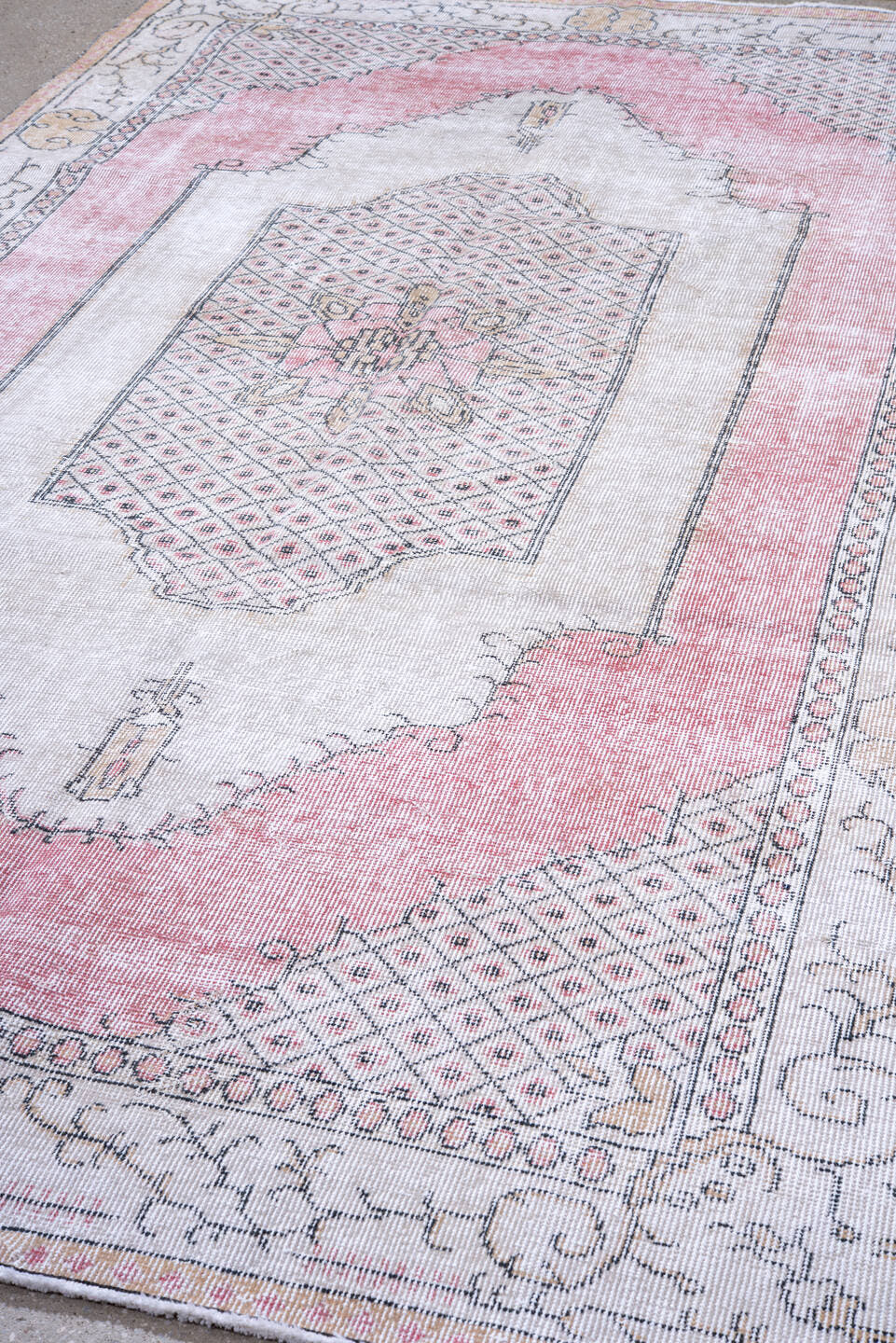 5' x 9' one-of-a-kind handmade antique Sparta medium size rug. Color palette: ivory, blush, pink, taupe, charcoal, rose