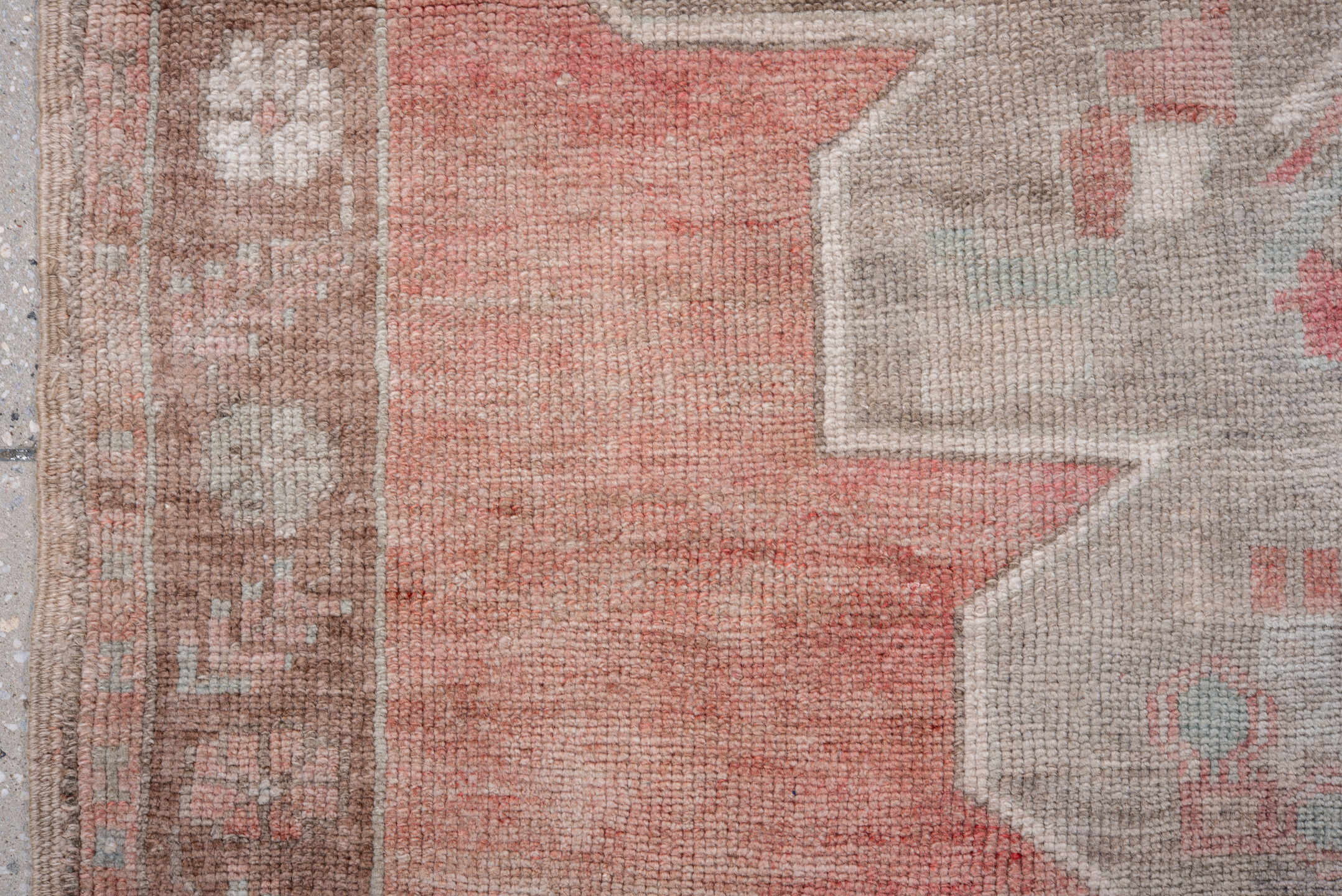 5' x 9' one-of-a-kind handmade antique Oushak medium size rug. Color palette: coral, taupe, ivory, rose, beige, soft gray