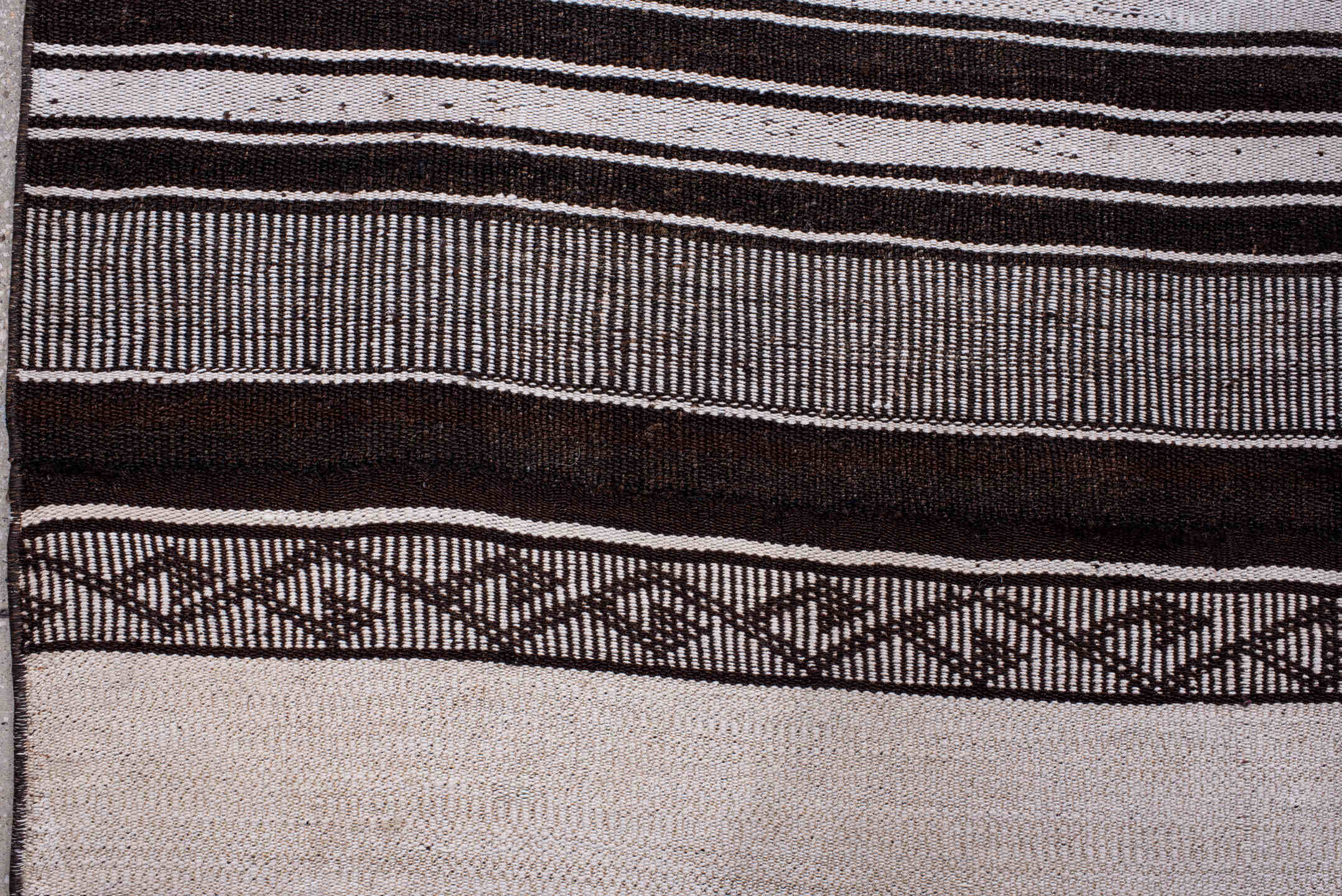 12' x 13' one-of-a-kind handmade antique Flatweave oversize rug. Color palette: ivory, charcoal, brown, taupe, gray, black