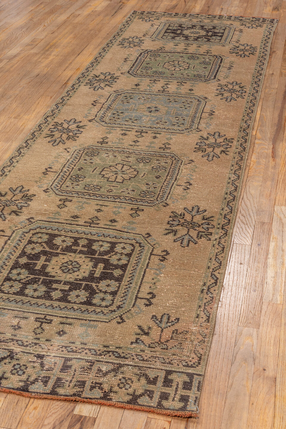 3' x 11' one-of-a-kind handmade vintage Oushak runner rug. Color palette: tan, brown, blue_gray, taupe, ivory, charcoal