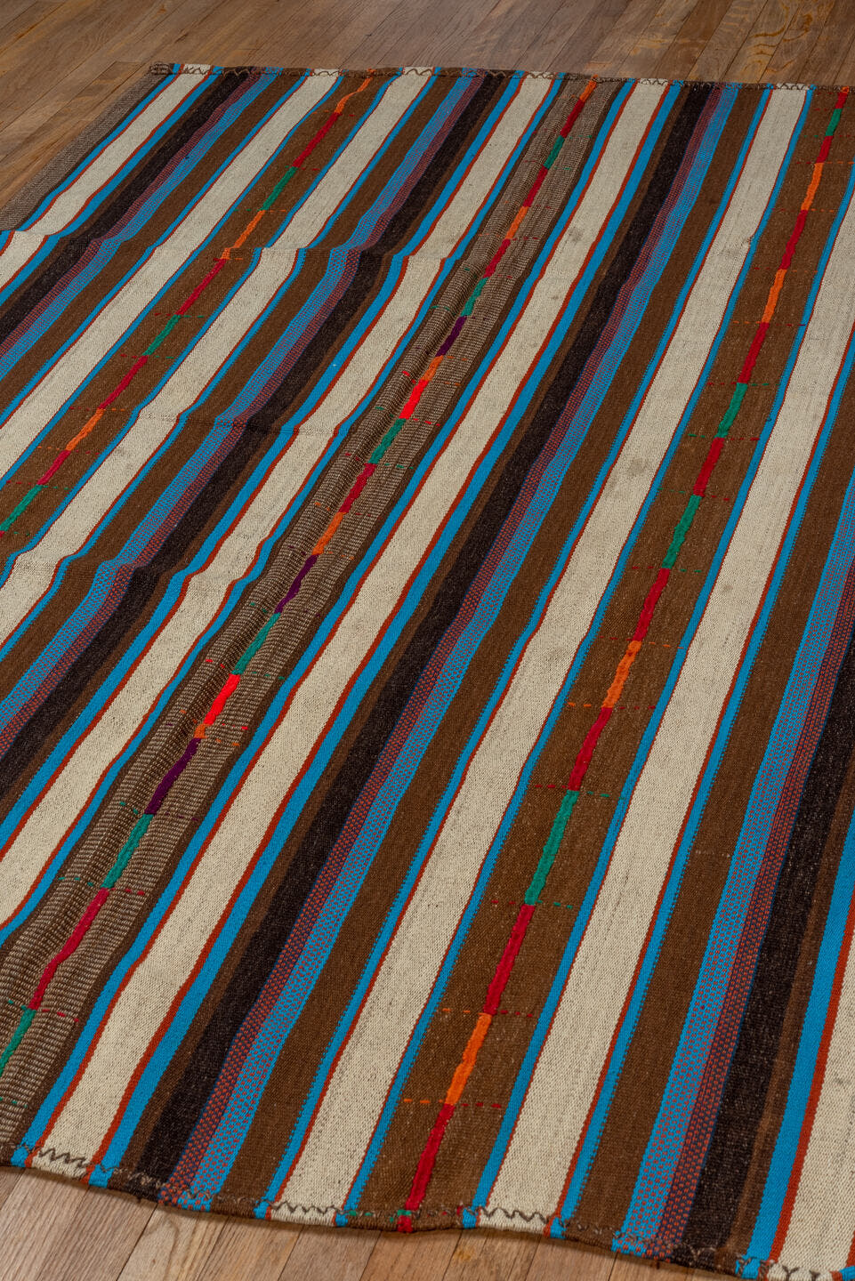 5' x 7' one-of-a-kind handmade vintage Kilim rug. Color palette: ivory, brown, turquoise, charcoal, taupe, rust, crimson
