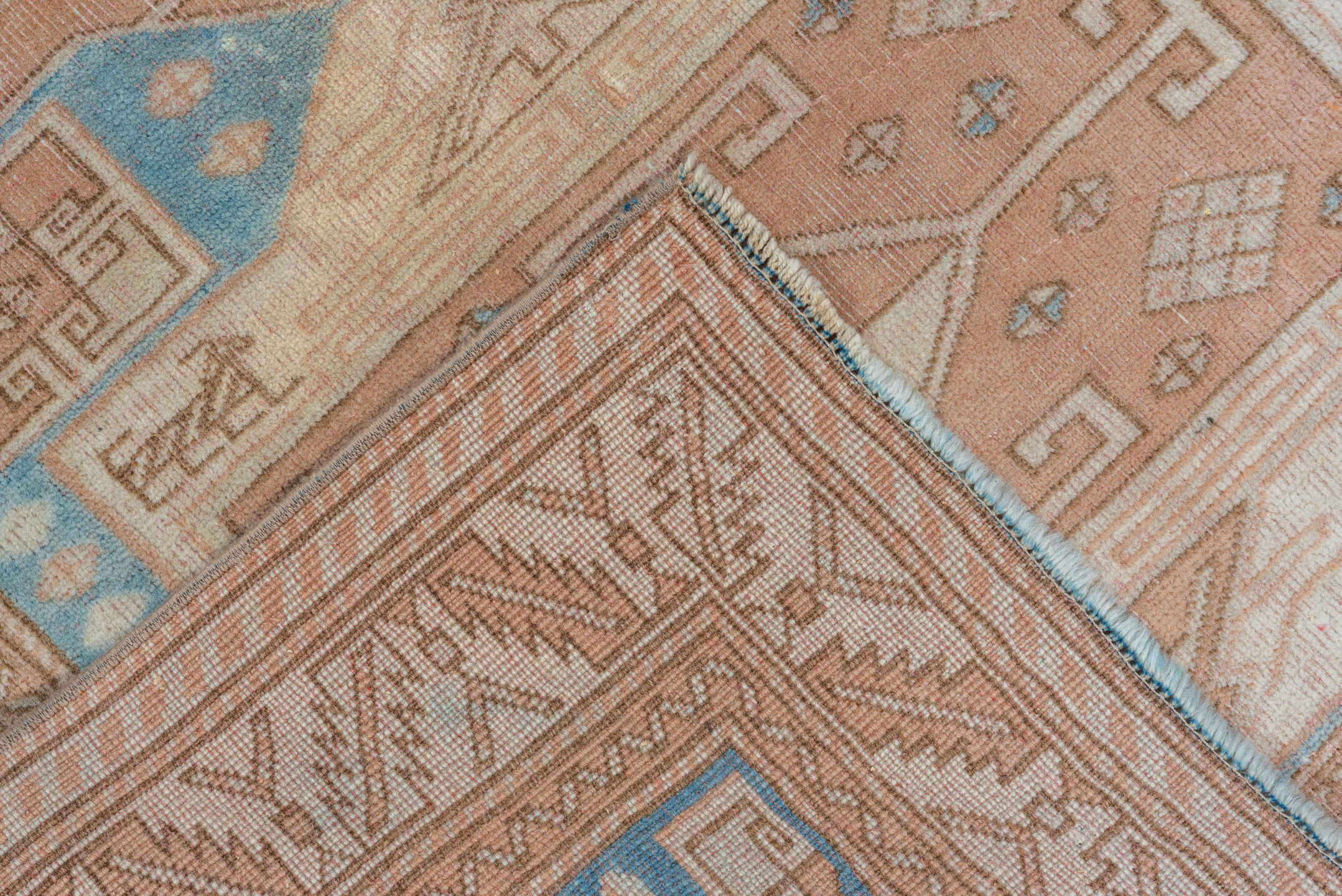 2' x 11' one-of-a-kind handmade antique Oushak runner rug. Color palette: ivory, blush, sky blue, taupe, camel, pink