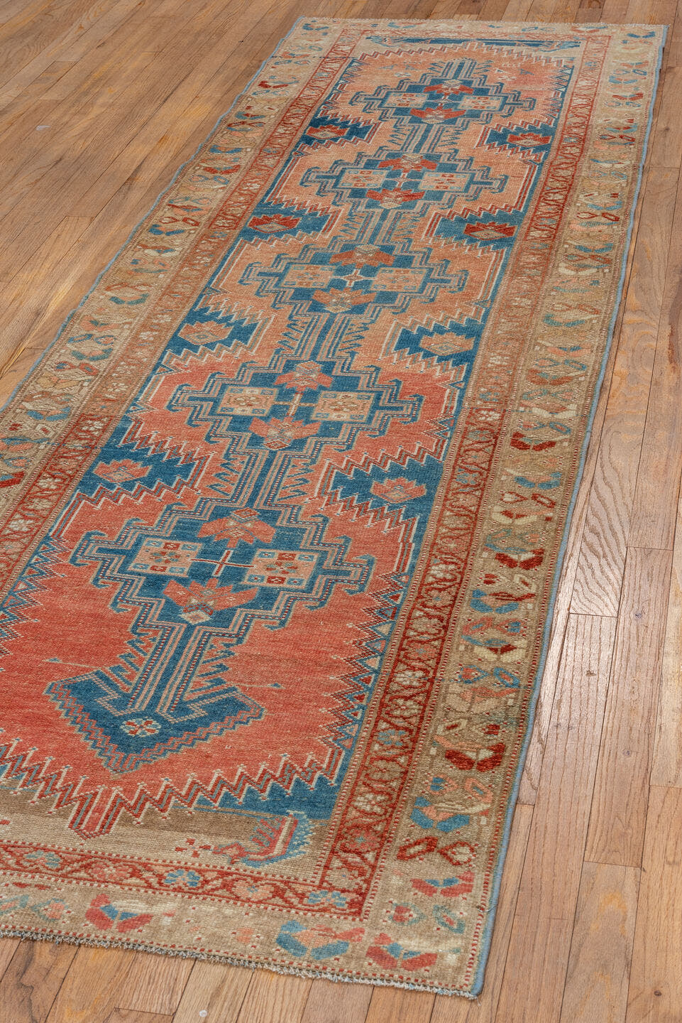 2' x 9' one-of-a-kind handmade vintage NW Persian runner rug. Color palette: salmon, ivory, teal, rust, camel, sky_blue